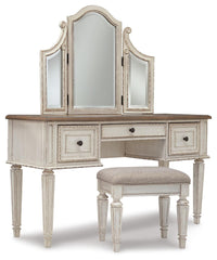 Realyn King Storage Bed, Dresser, Mirror, Chest, Vanity with Stool and 2 Nightstands