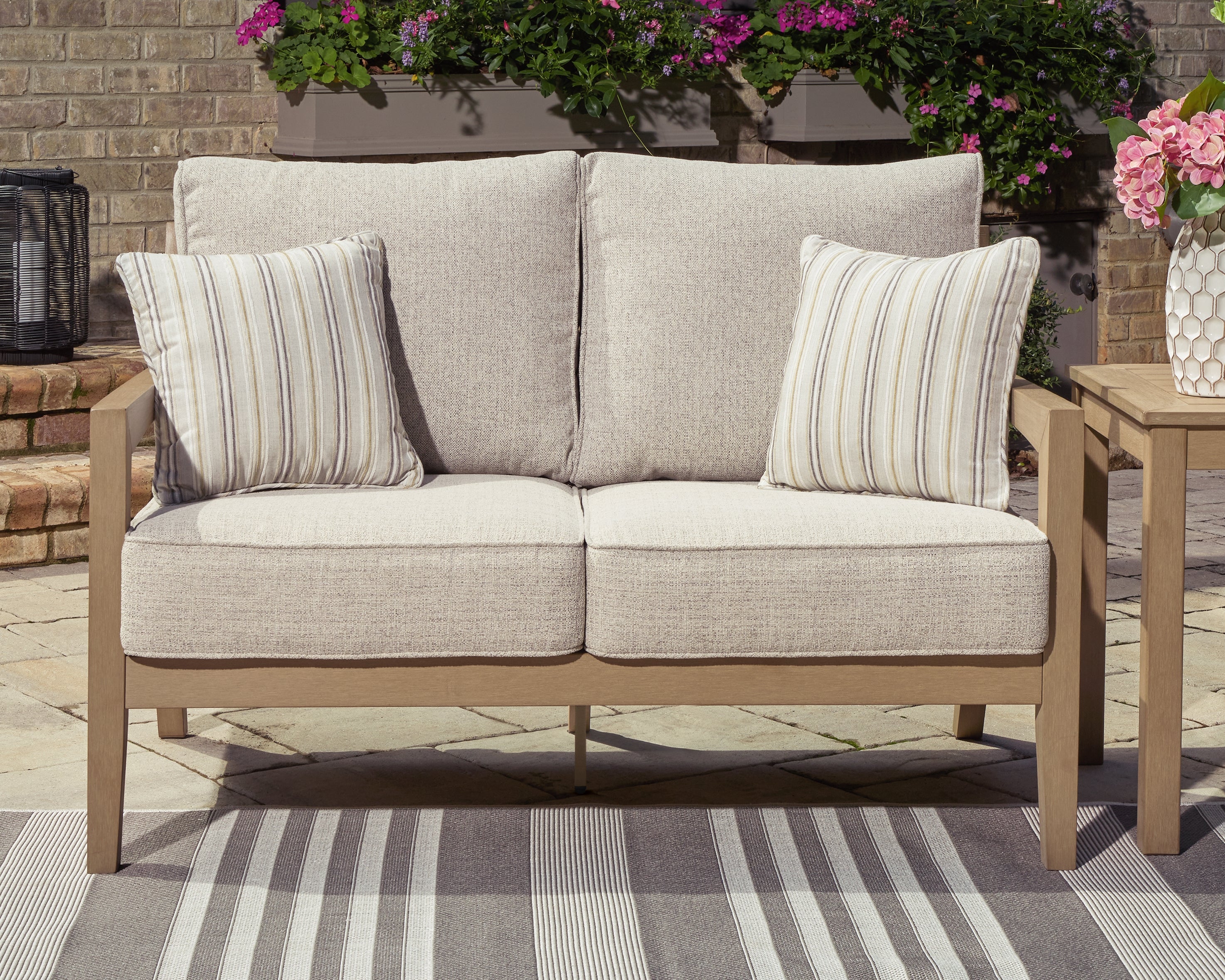 Best Deals Furniture - Ashley Furniture - Hallow Creek Outdoor Loveseat with Cushion - Loveseat w/Cushion - P560-835