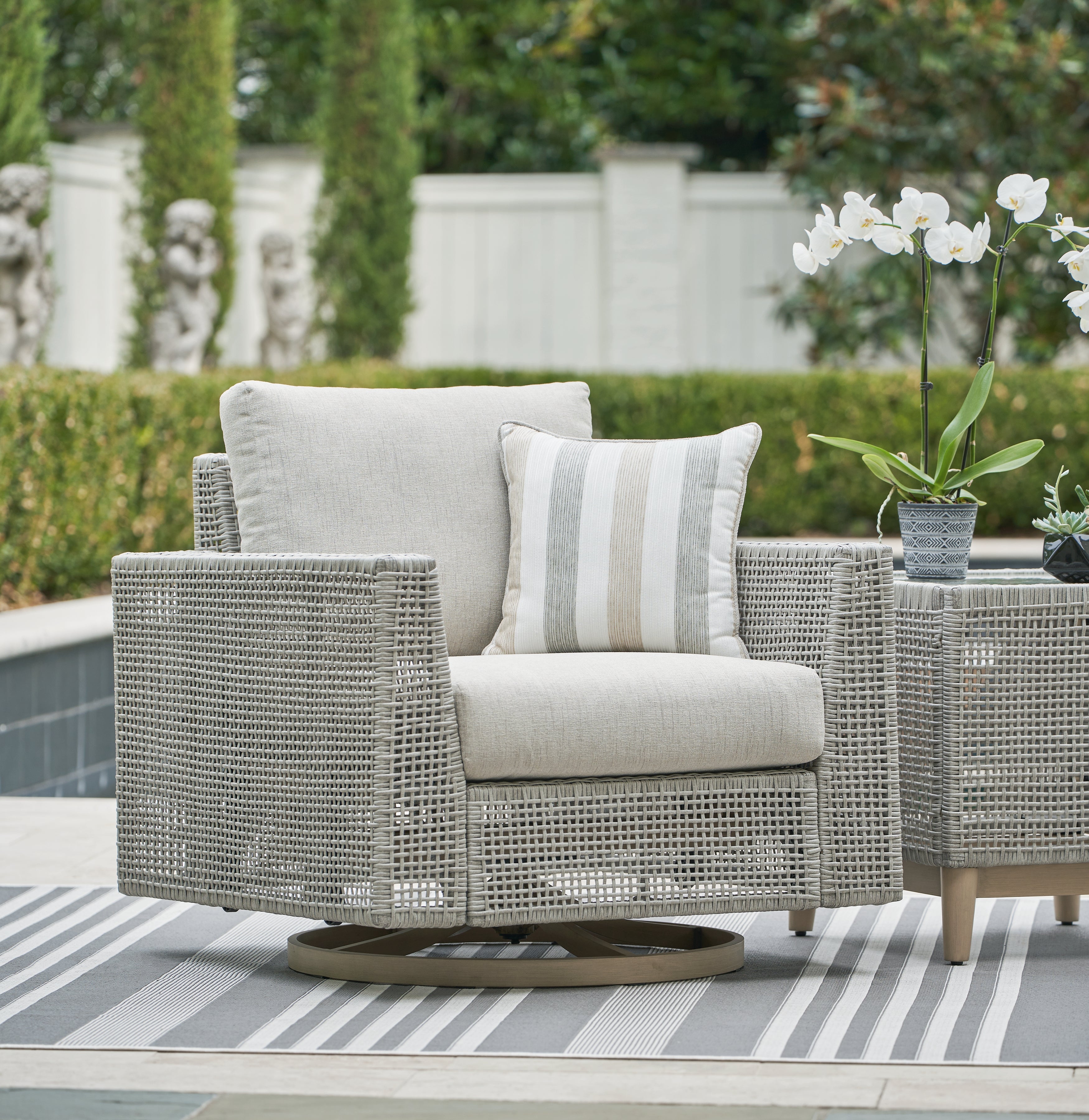 Best Deals Furniture - Ashley Furniture - Seton Creek Outdoor Swivel Lounge with Cushion - Swivel Lounge w/ Cushion - P798-821
