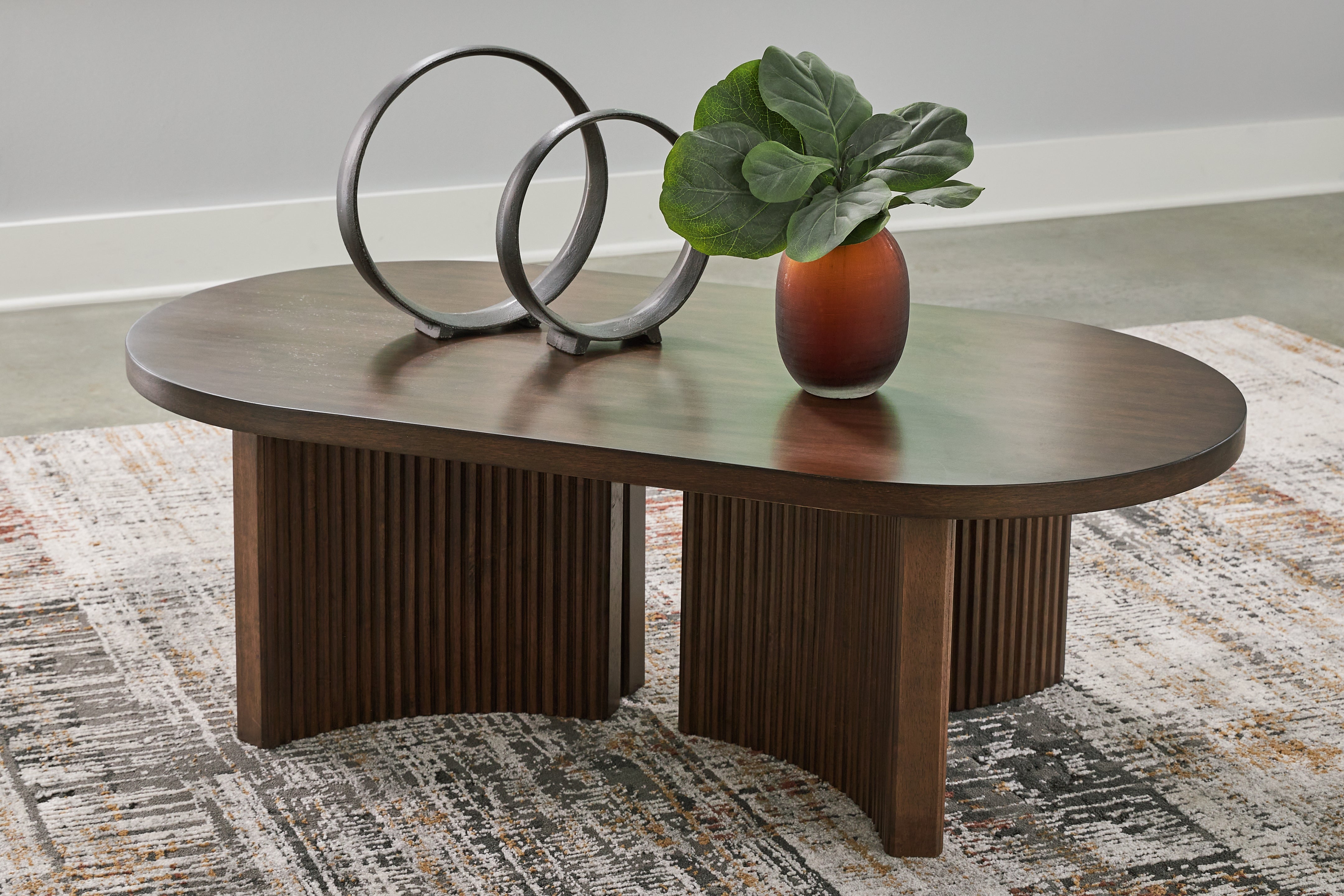 Best Deals Furniture - Ashley Furniture - Korestone Coffee Table - Oval Cocktail Table - T689-0