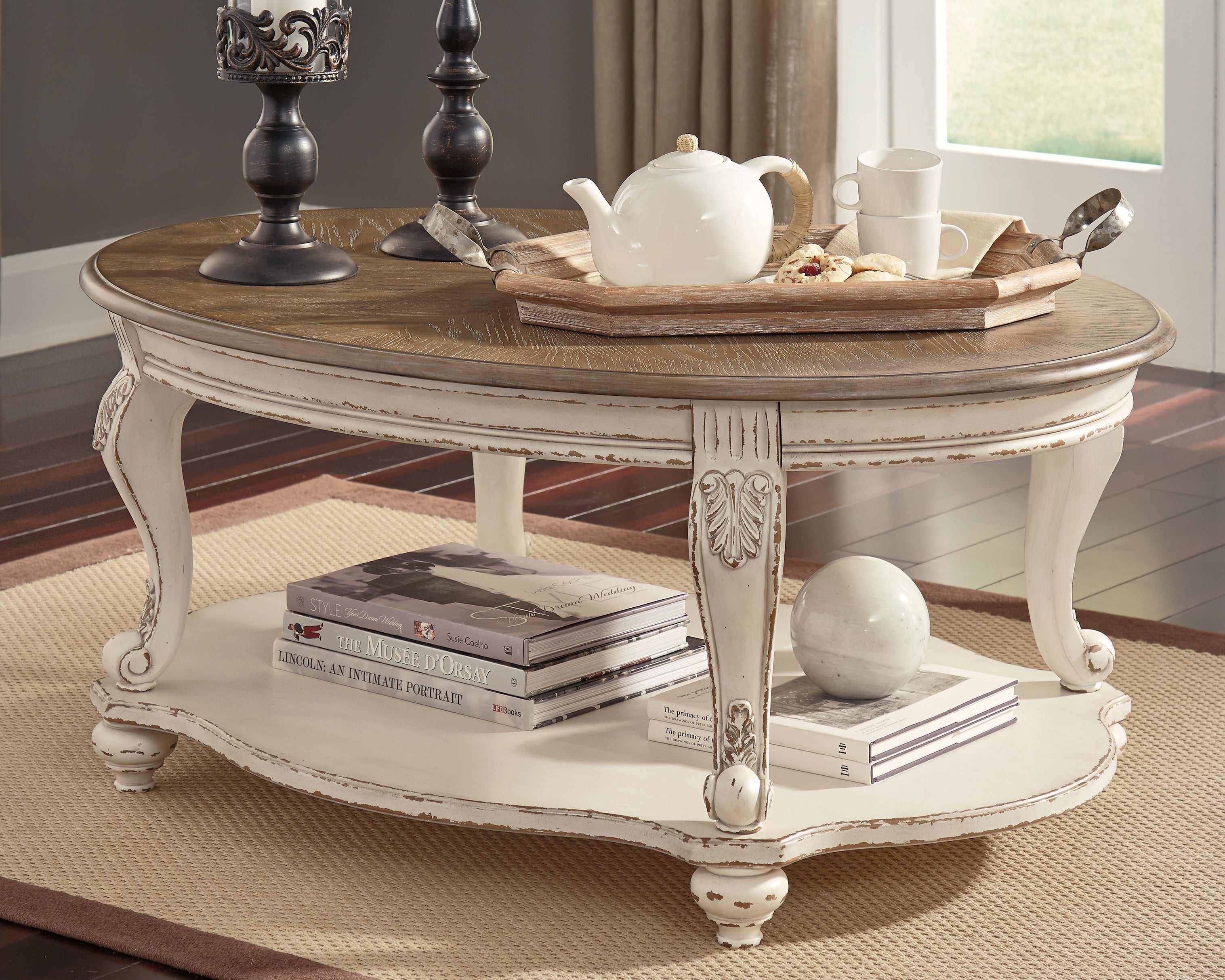 Best Deals Furniture - Ashley Furniture - Realyn Coffee Table - Oval Cocktail Table - T743-0
