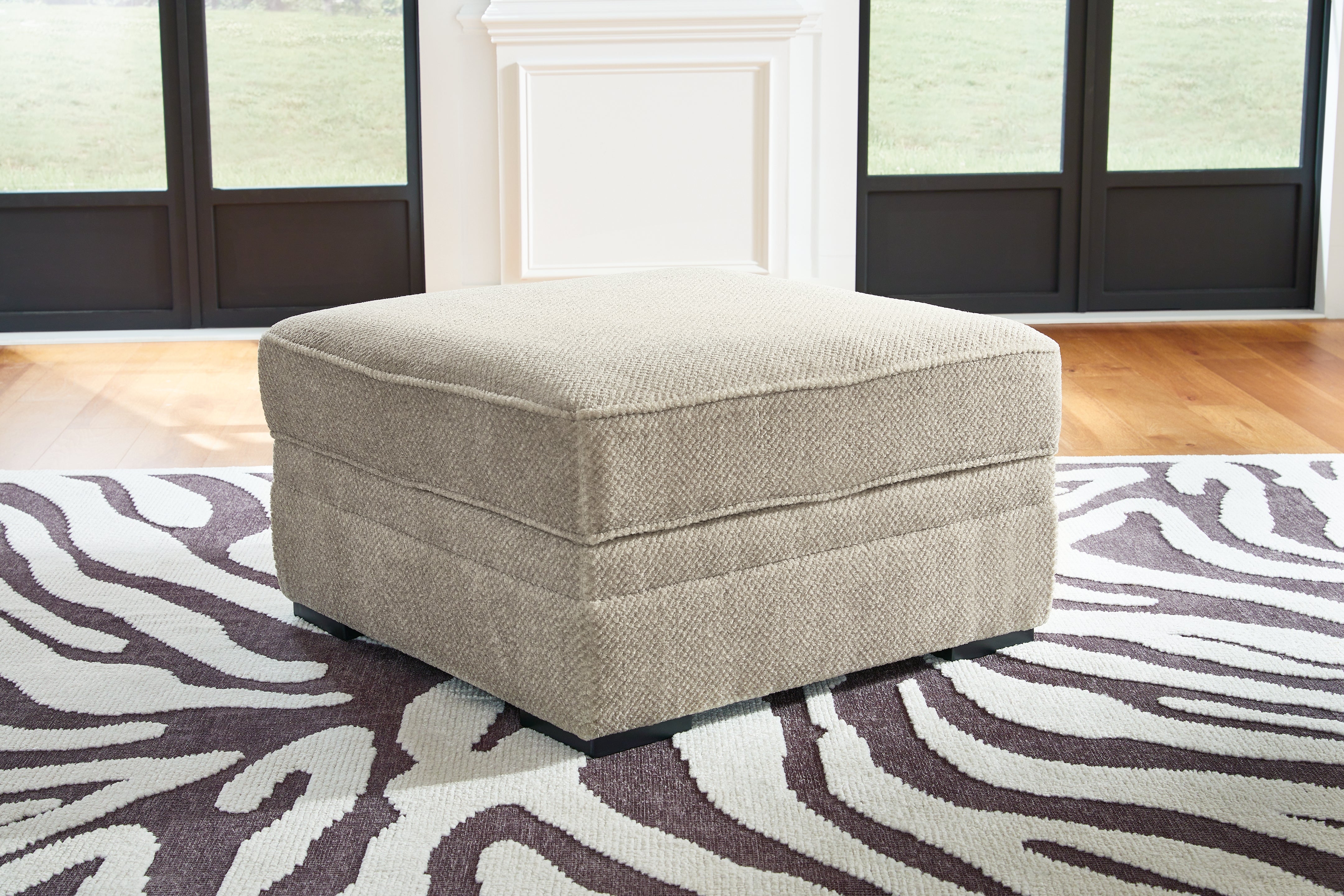 Calnita Oversized Swivel Chair and Ottoman