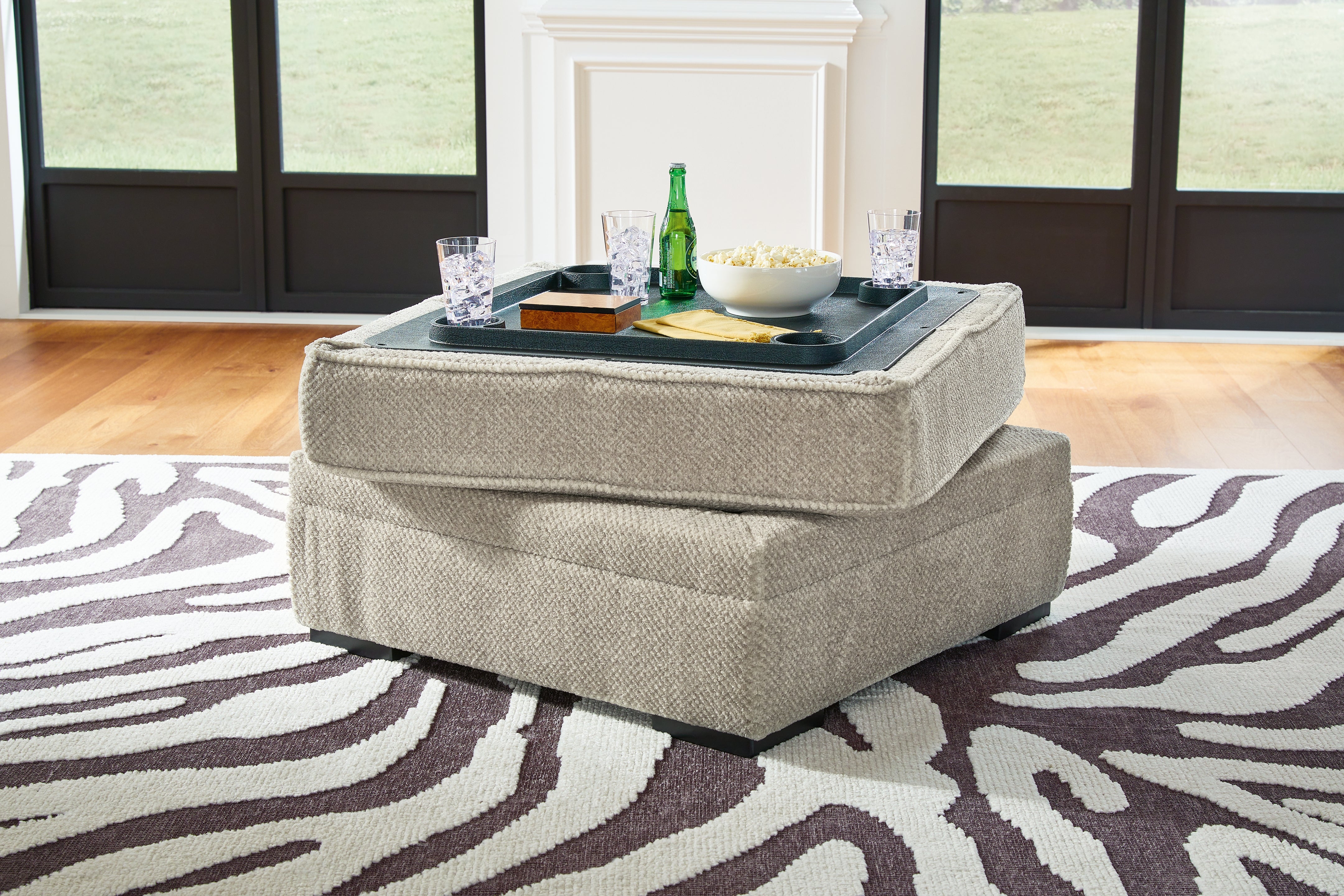 Calnita Oversized Swivel Chair and Ottoman
