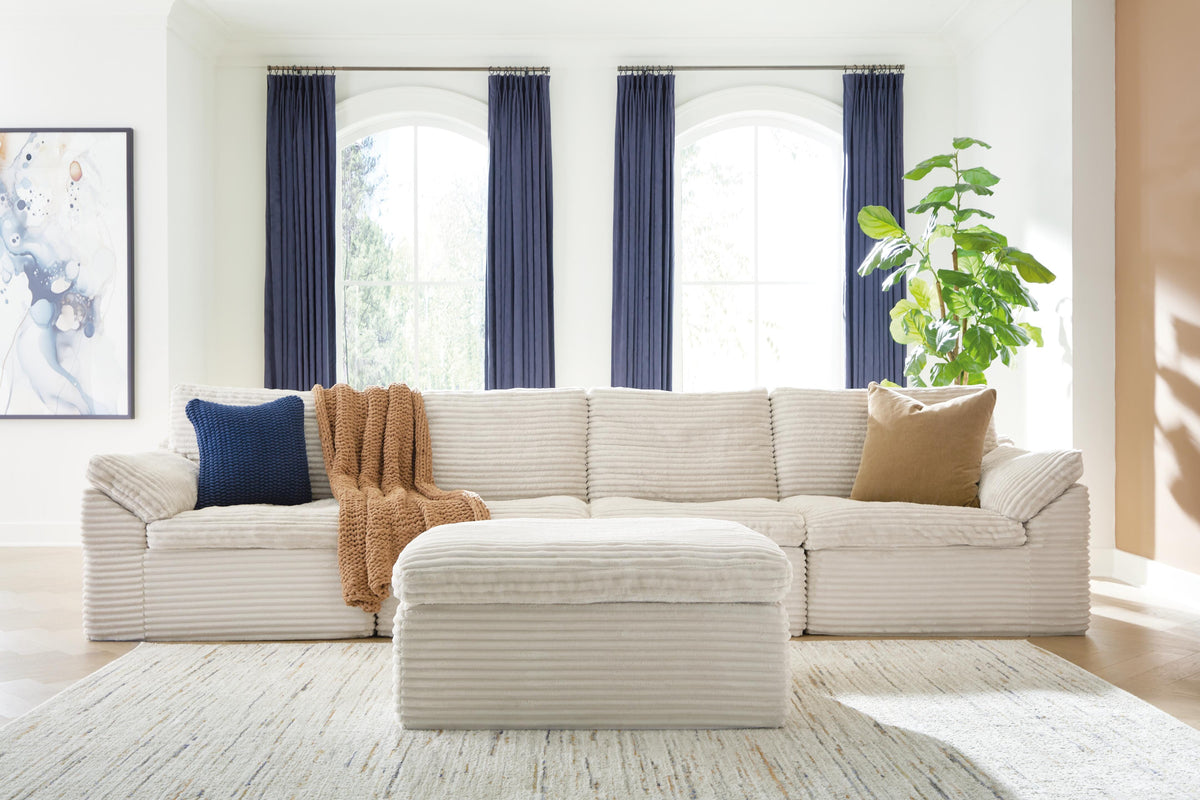 Best Deals Furniture - Ashley Furniture - Fannin 4-Piece Sectional with Ottoman - RAF 4-Piece Sectional with Ottoman - PC84304S1