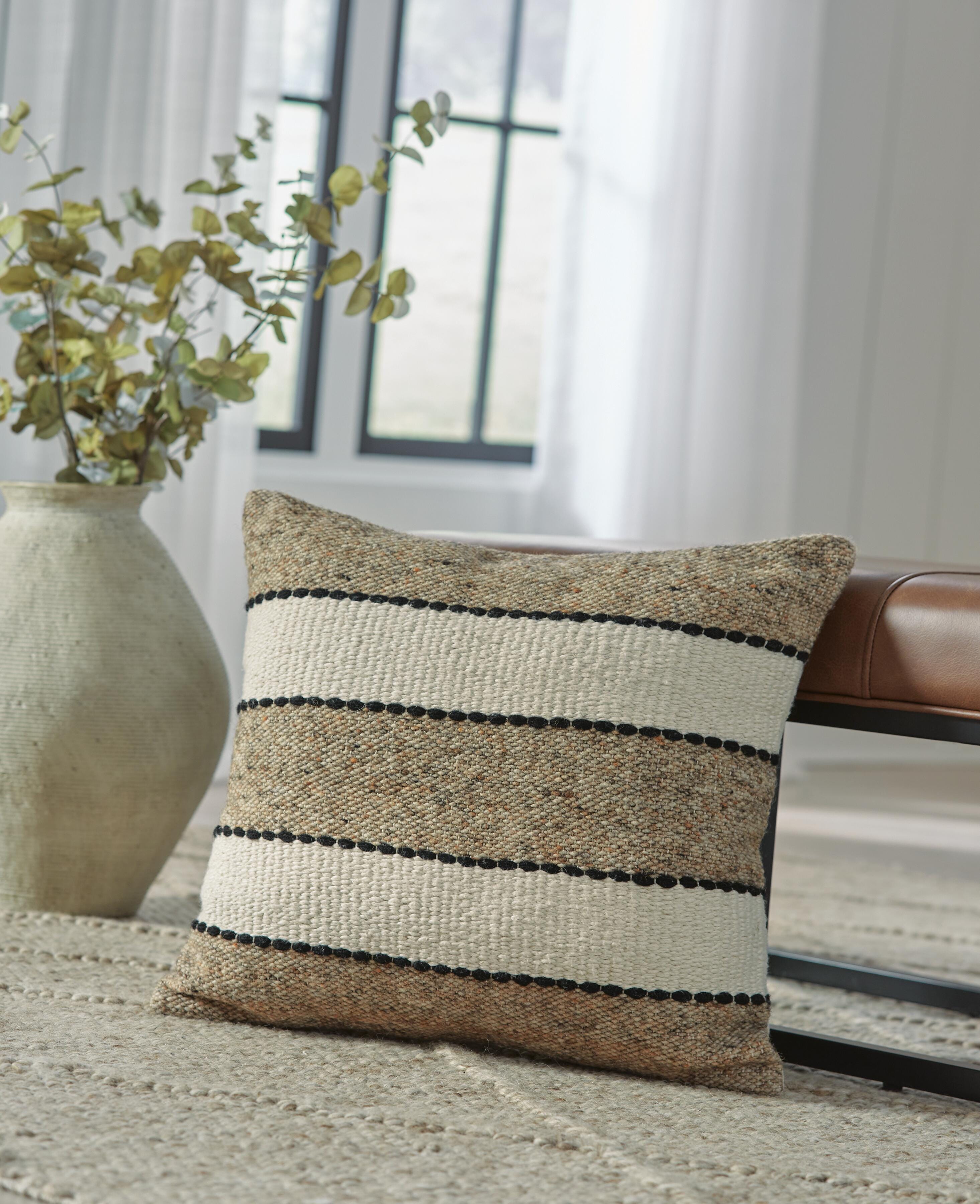 Best Deals Furniture - Ashley Furniture - Rueford Pillow - Pillow - A1001063P