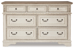 Realyn Queen Upholstered Storage Bed, Dresser and Nightstand