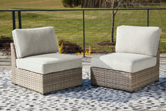 Best Deals Furniture - Ashley Furniture - Calworth Outdoor Armless Chair with Cushion (Set of 2) - Armless Chair w/Cushion (Set of 2) / Beige - P458-846