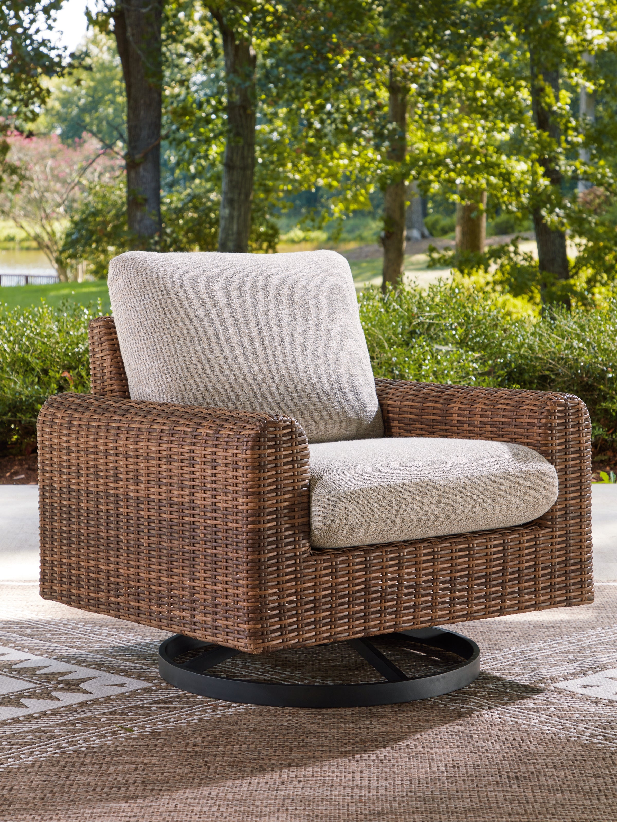 Best Deals Furniture - Ashley Furniture - Dolan Creek Outdoor Swivel Lounge Chair with Cushion - Swivel Lounge w/ Cushion / Gray/Brown - PCP610-821