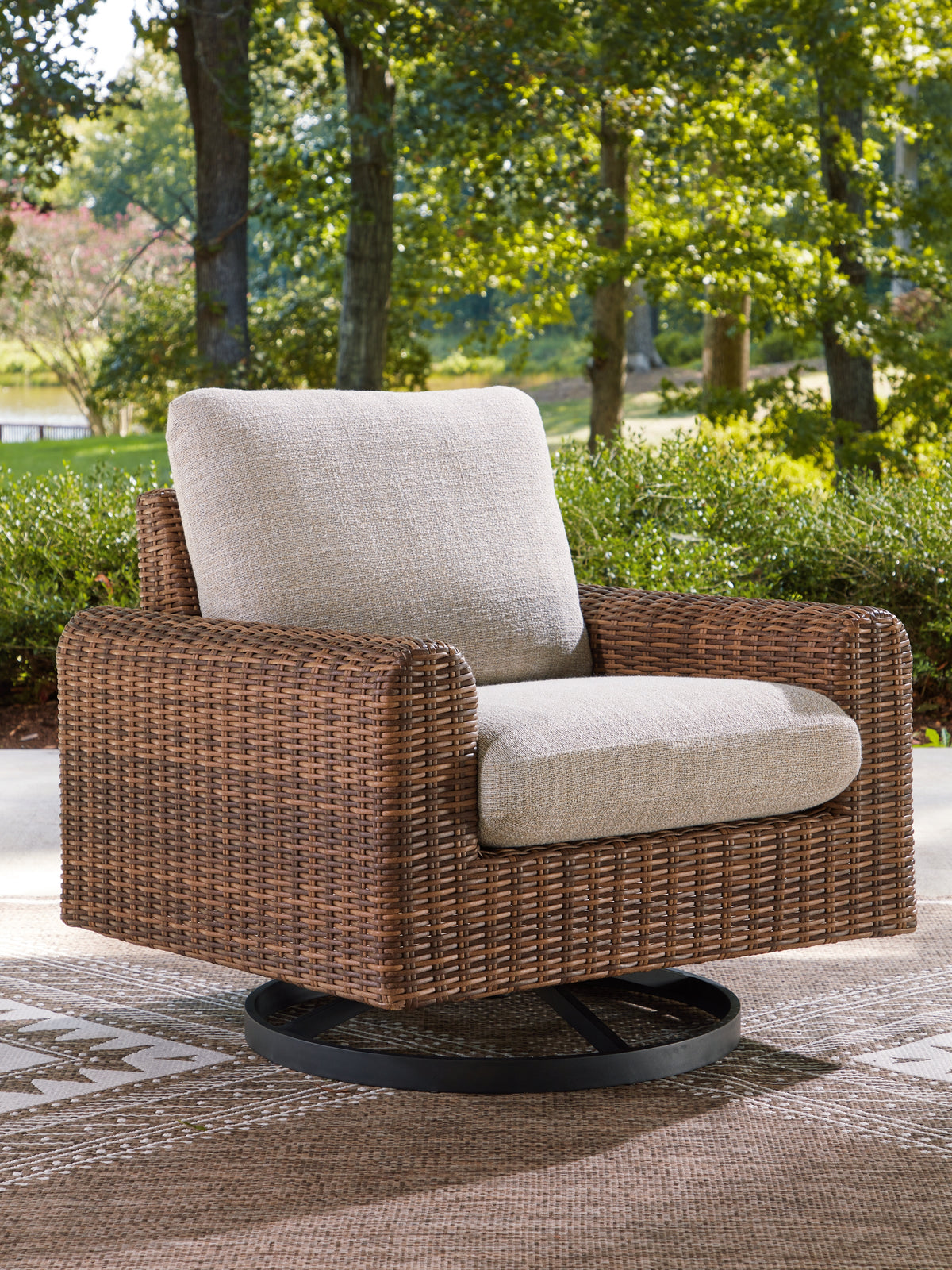 Best Deals Furniture - Ashley Furniture - Dolan Creek Outdoor Swivel Lounge Chair with Cushion - Swivel Lounge w/ Cushion / Gray/Brown - PCP610-821