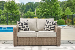 Best Deals Furniture - Ashley Furniture - Beachcroft Outdoor Loveseat with Cushion - Loveseat w/Cushion / Beige - P791-835