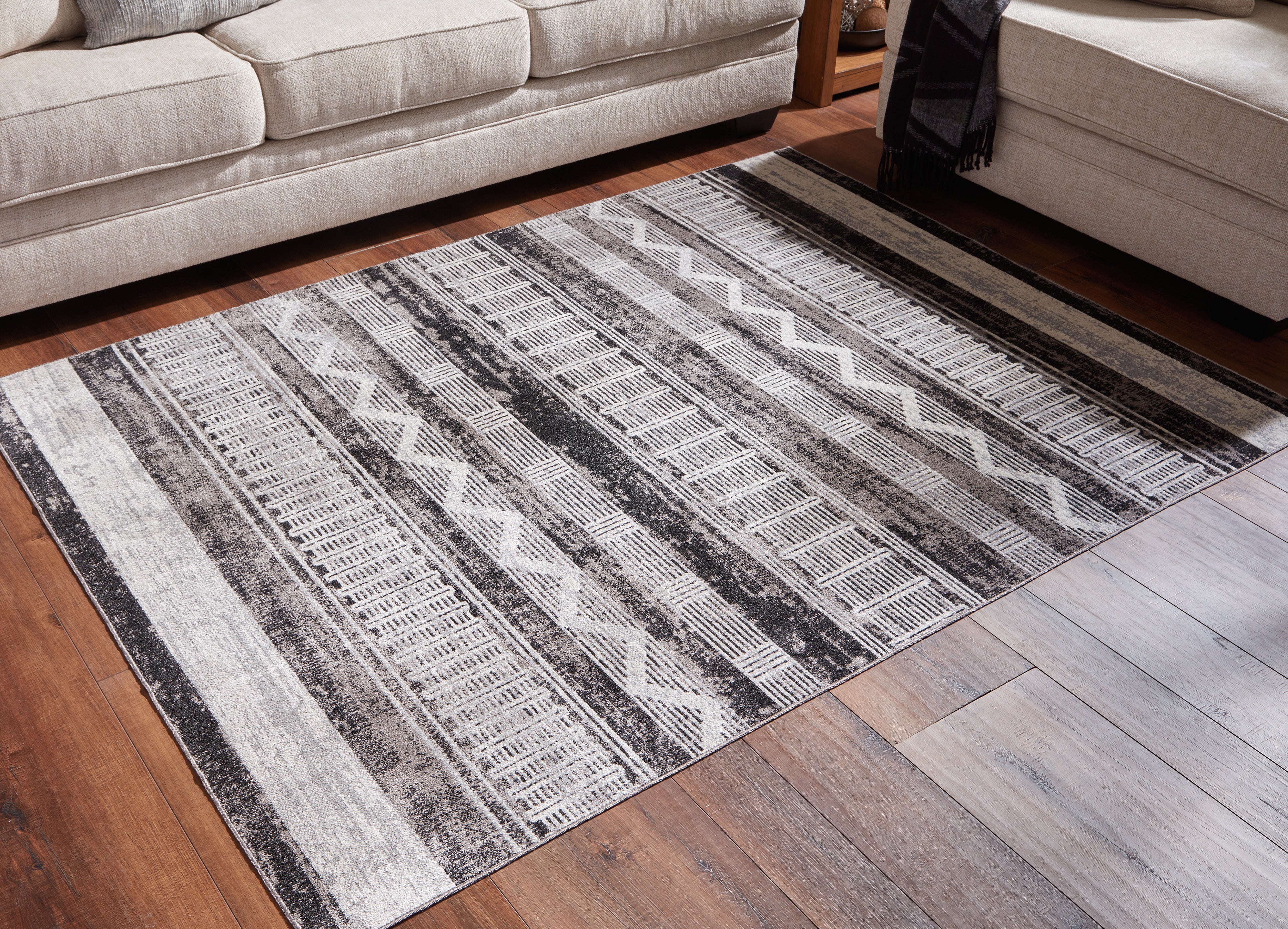 Best Deals Furniture - Ashley Furniture - Henchester 5' x 7' Washable Rug - 5' x 7' Washable Rug - R405992