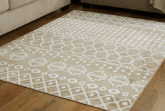 Best Deals Furniture - Ashley Furniture - Bunchly 4'11" x 7'2" Washable Rug - 4'11" x 7'2" Washable Rug / Tan/Brown/Cream - R406222