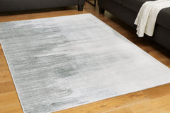 Best Deals Furniture - Ashley Furniture - Milset 8'1" x 10' Washable Rug - 8'1" x 10' Washable Rug / Black/White/Gray - R406251