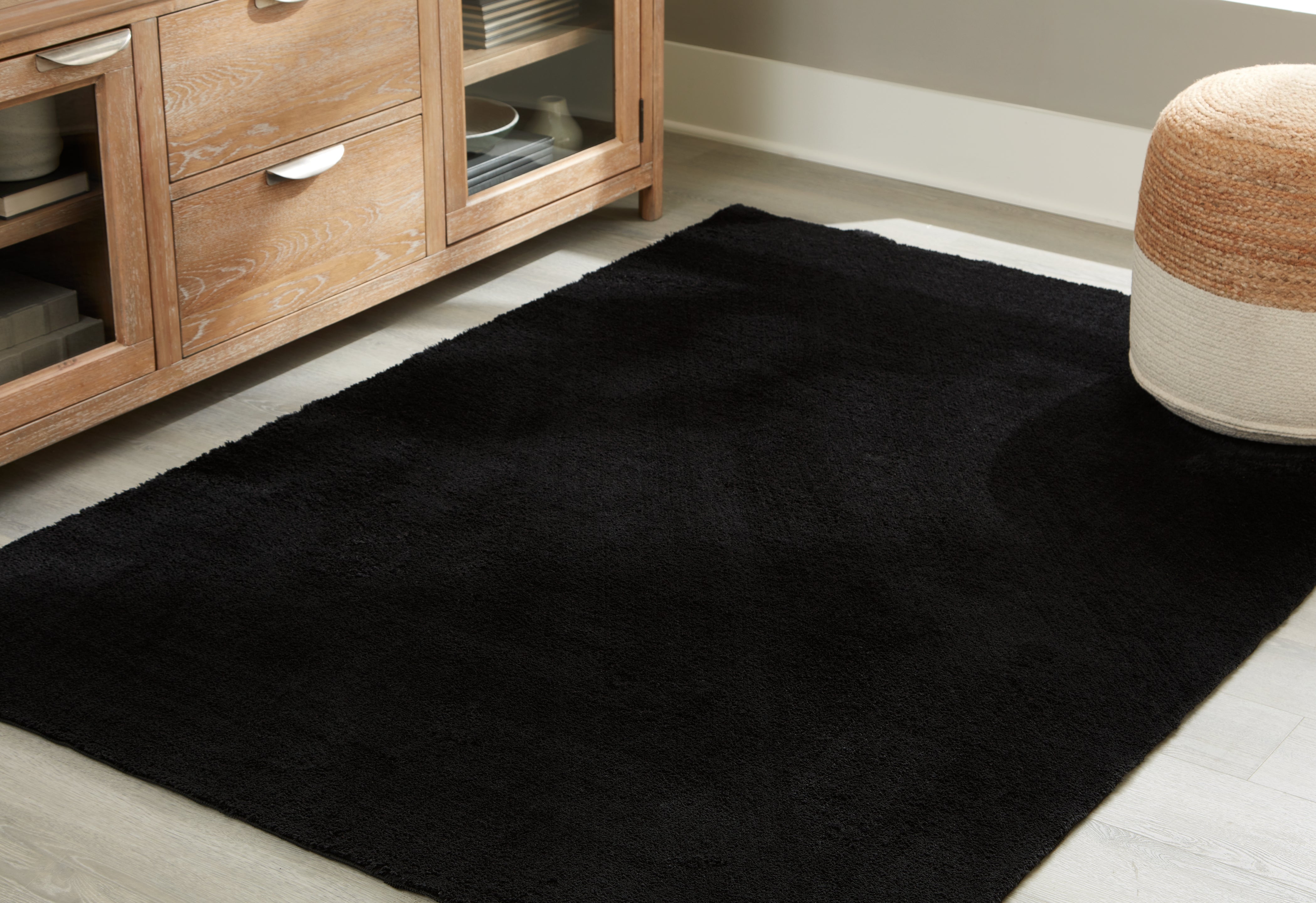 Best Deals Furniture - Ashley Furniture - Anaben 5' x 7' Washable Rug - 5' x 7' Washable Rug / Black - R406312
