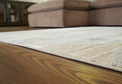 Best Deals Furniture - Ashley Furniture - Truward 8' x 10' Rug - 8' x 10' Rug / Linen/Gray/Caramel - R406471