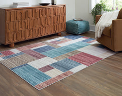 Best Deals Furniture - Ashley Furniture - Numore 5'2" x 6'11" Washable Rug - 5'2" x 6'11" Washable Rug / Multi - R406662