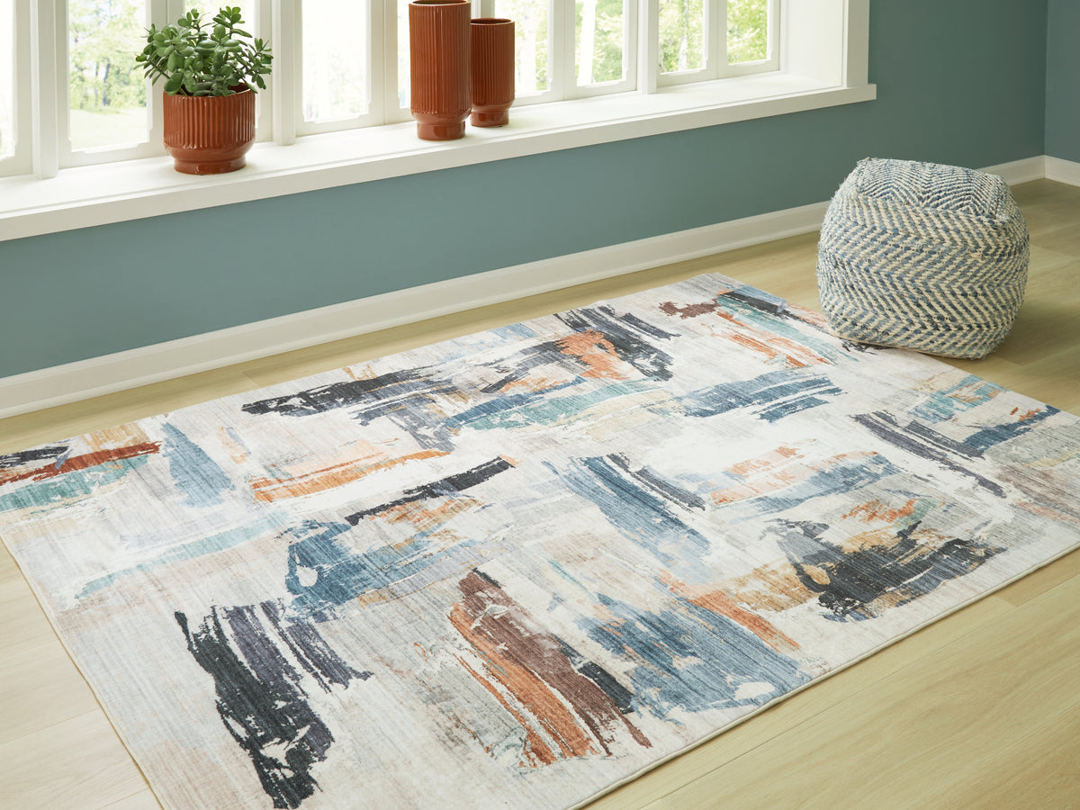 Best Deals Furniture - Ashley Furniture - Hessland 8' x 10' Washable Rug - 8' x 10' Washable Rug / Multi - R407051