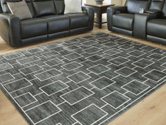Best Deals Furniture - Ashley Furniture - Elderland Washable 7'6" x 9'6" Area Rug - Washable 7'6" x 9'6" Area Rug / Black/Gray - R407401