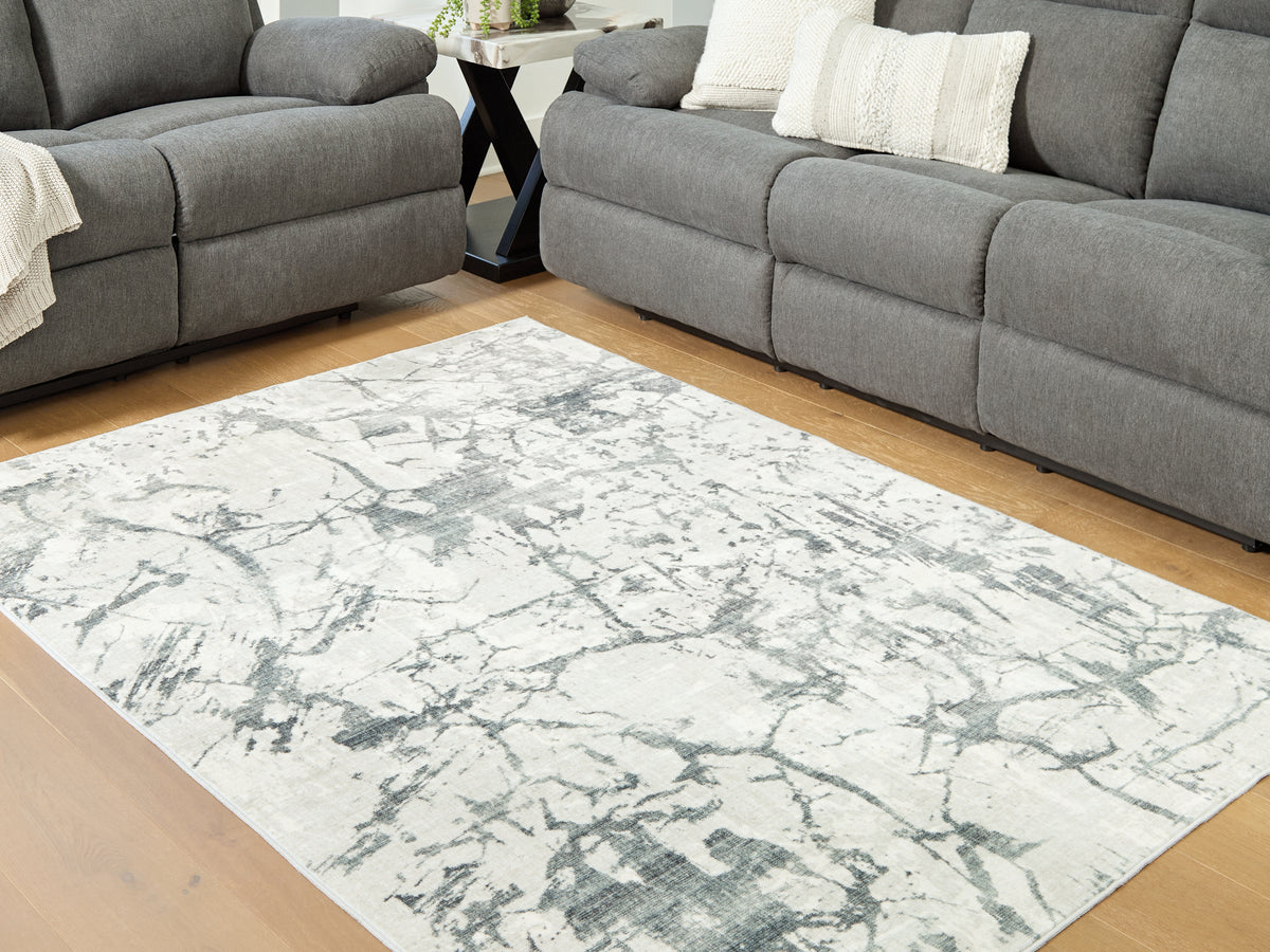 Best Deals Furniture - Ashley Furniture - Tobinbury Washable 5' x 7' Area Rug - Washable 5' x 7' Area Rug / Gray - R407422