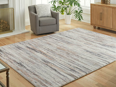 Best Deals Furniture - Ashley Furniture - Nace 7'6" x 9'6" Area Rug - 7'6" x 9'6" Area Rug / Gray/Brown/White - R407471