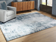 Best Deals Furniture - Ashley Furniture - Arlenmont 7'6" x 9'6" Area Rug - 7'6" x 9'6" Area Rug / Blue/White/Brown - R407481