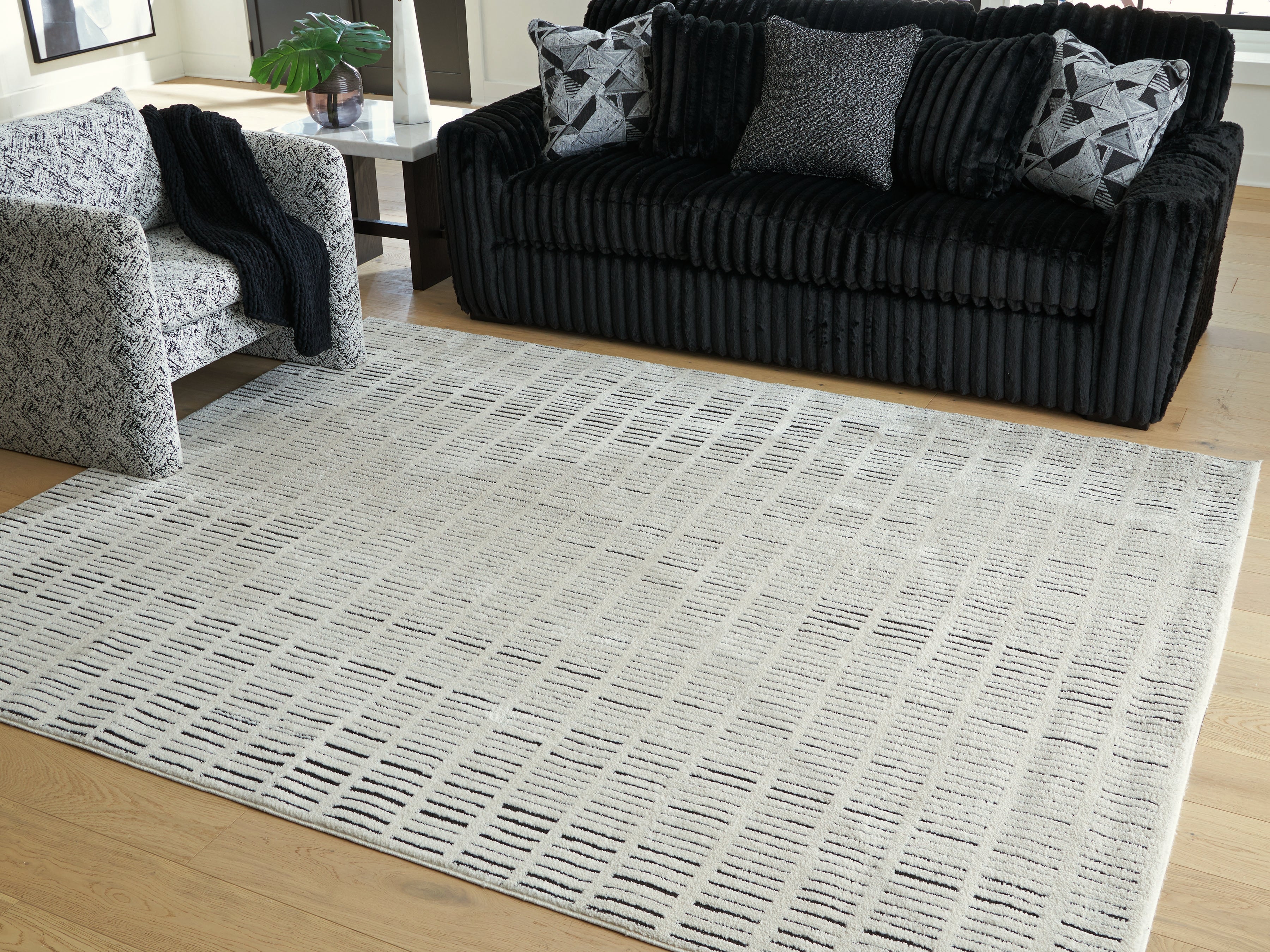 Best Deals Furniture - Ashley Furniture - Turinwith 7'10" x 9'10" Area Rug - 7'10" x 9'10" Area Rug / Ivory/Black - R407551
