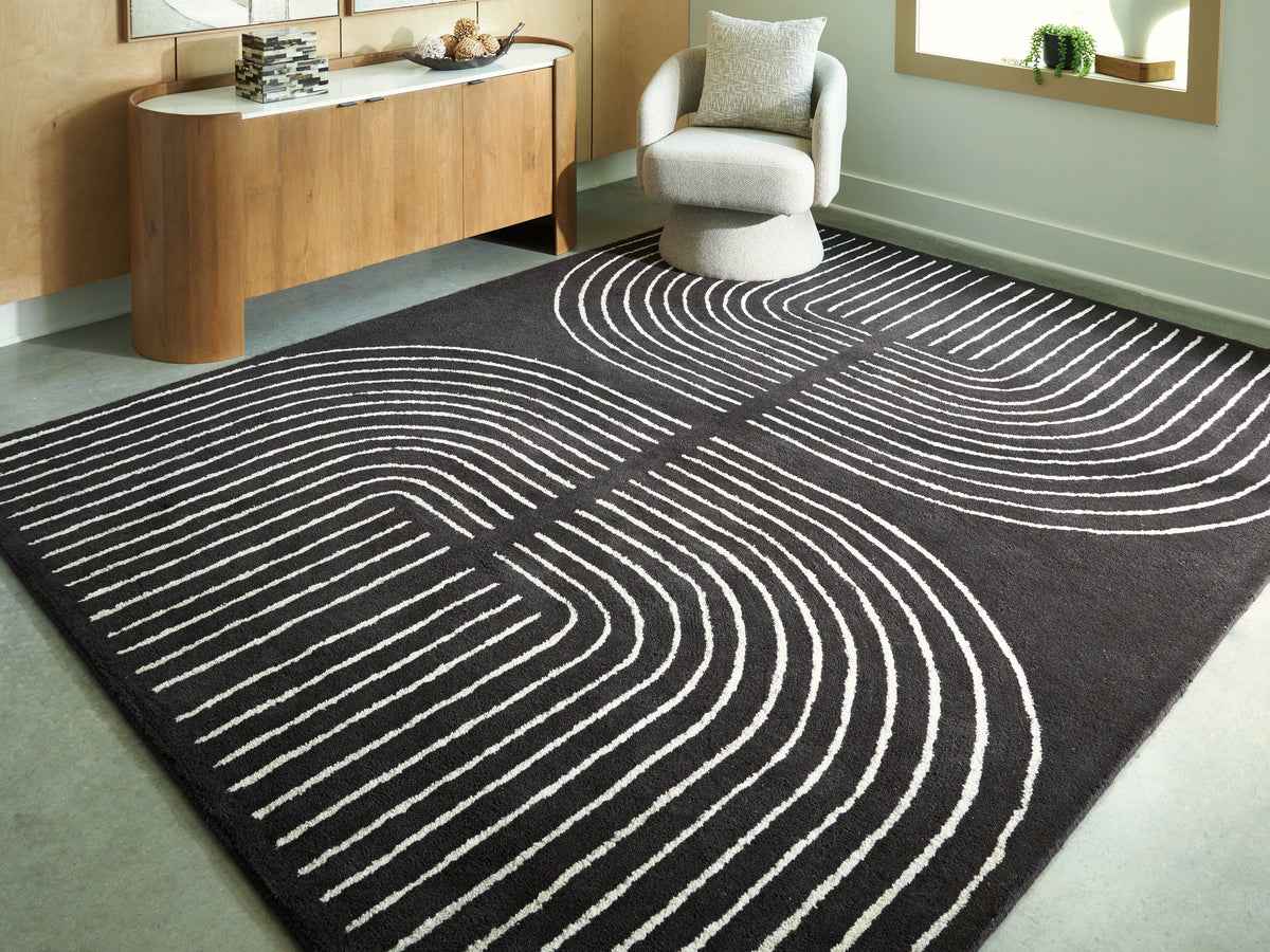 Best Deals Furniture - Ashley Furniture - Eldonmore 7'8" x 10' Area Rug - 7'8" x 10' Area Rug / Black/Ivory - R407571