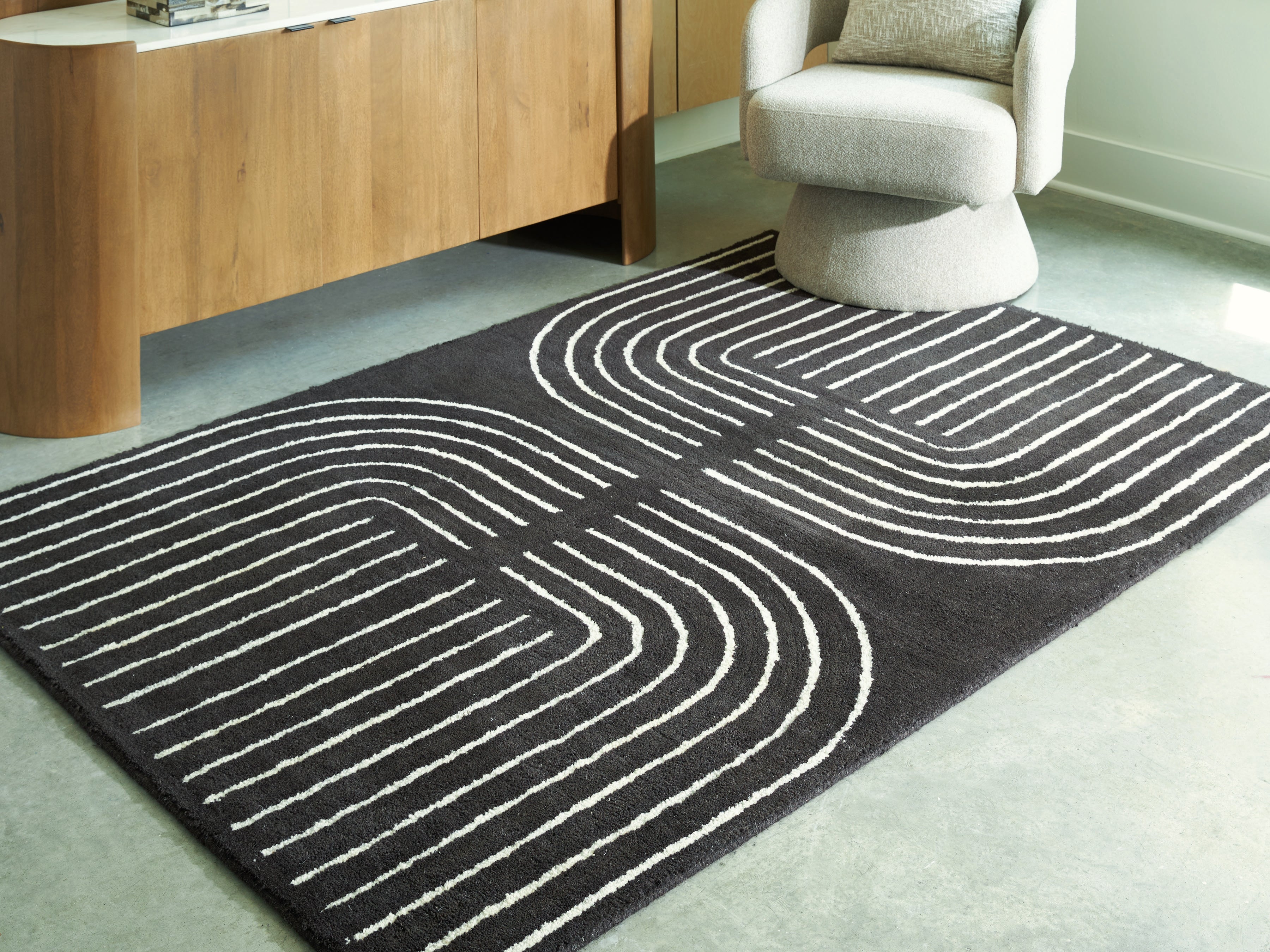 Best Deals Furniture - Ashley Furniture - Eldonmore 5' x 7' Area Rug - 5' x 7' Area Rug / Black/Ivory - R407572