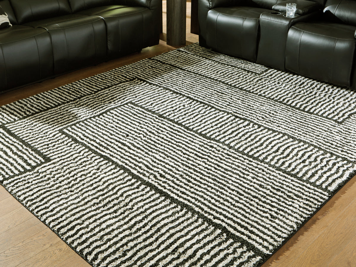 Best Deals Furniture - Ashley Furniture - Kurtmen 7'10" x 9'10" Area Rug - 7'10" x 9'10" Area Rug / Black/Ivory - R407591