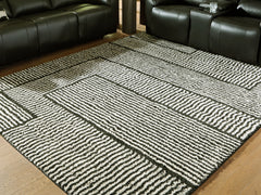 Best Deals Furniture - Ashley Furniture - Kurtmen 7'10" x 9'10" Area Rug - 7'10" x 9'10" Area Rug / Black/Ivory - R407591