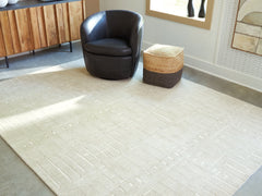 Best Deals Furniture - Ashley Furniture - Wolbert 7'8" x 10' Area Rug - 7'8" x 10' Area Rug / Tan/Ivory - R407661