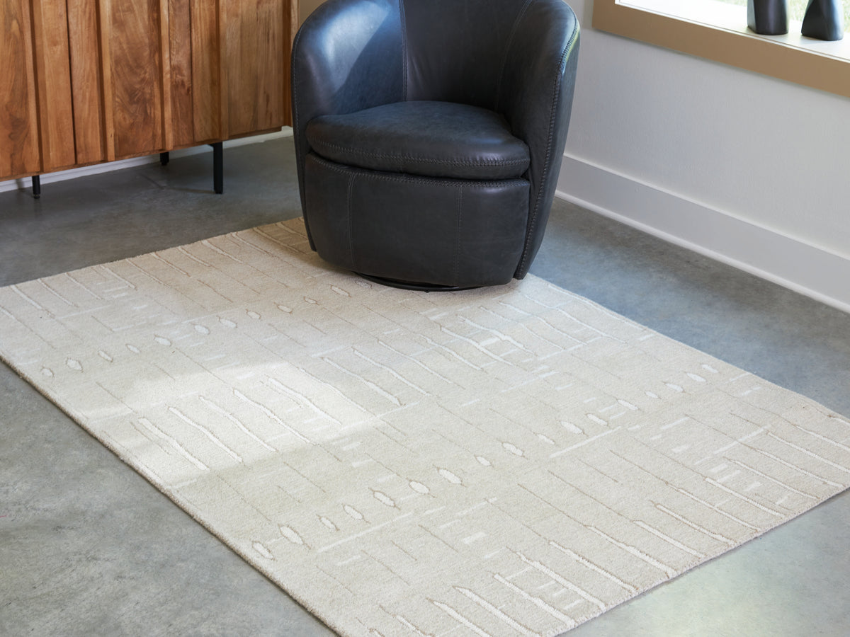 Best Deals Furniture - Ashley Furniture - Wolbert 5' x 7' Area Rug - 5' x 7' Area Rug / Tan/Ivory - R407662