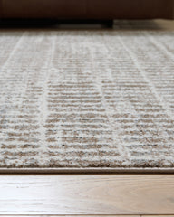 Fuadwick 5'3" x 7' Area Rug
