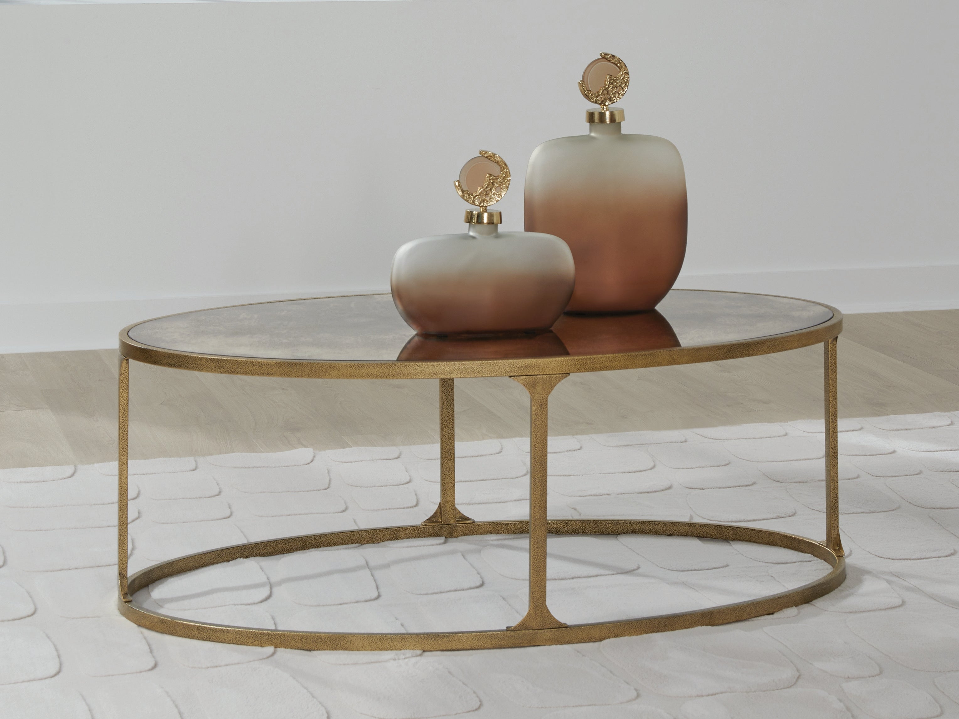 Best Deals Furniture - Ashley Furniture - Korajane Coffee Table - Oval Cocktail Table / Antique Gold - T399-0