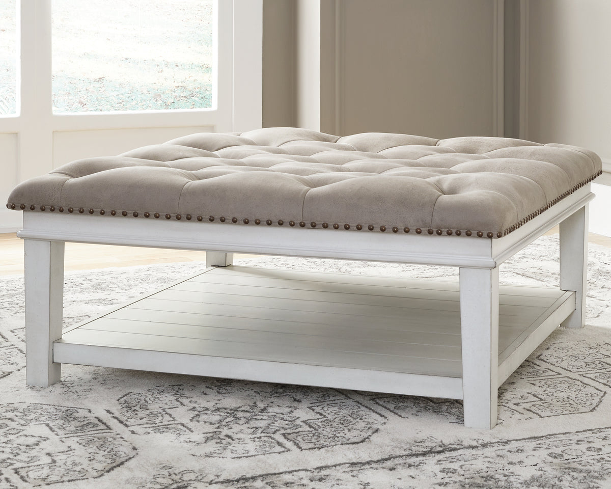 Best Deals Furniture - Ashley Furniture - Kanwyn Upholstered Ottoman Coffee Table - UPH Ottoman Cocktail Table / Whitewash - T937-21